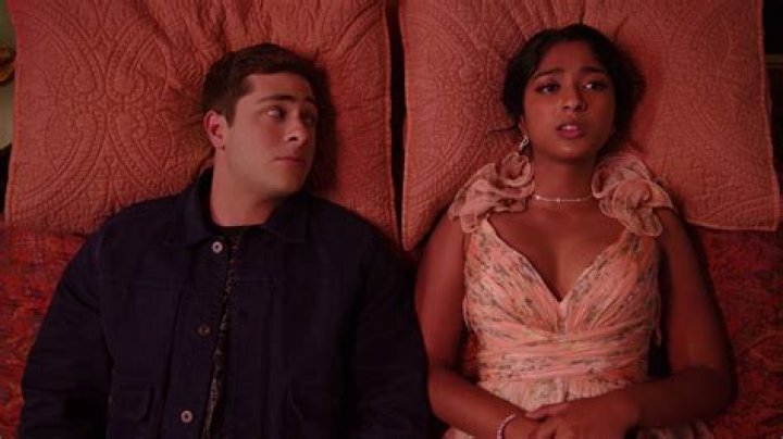 Does Devi end up with Ben or Paxton?