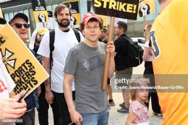 Jesse Eisenberg walks a picket line in support of the SAG-AFTRA and WGA strike outside HBO/Amazon Corporate Headquarters in Hudson Yards on August ...